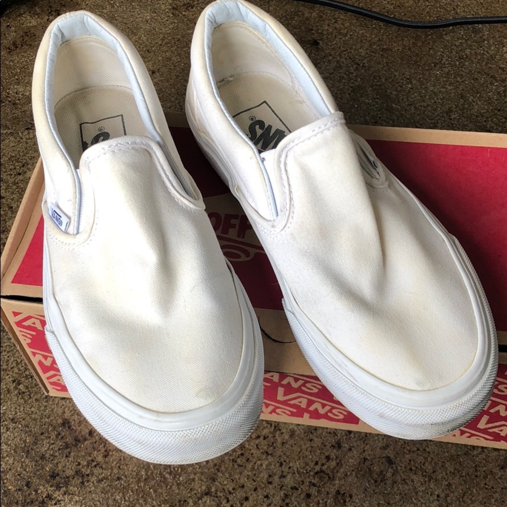 Dingy white vans